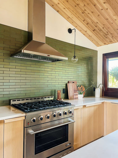 Customer kitchen with the Proline PLFW 129 J - Wall-Mounted Vent Hood, 900 CFM | Stainless Steel