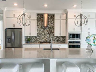 Customer kitchen with the Proline PLFW 544 - Wall-Mounted Range Hood, 600 CFM | Convertible to Ductless, Stainless Steel Finish