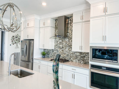 Customer kitchen with the Proline PLFW 544 - Wall-Mounted Range Hood, 600 CFM | Convertible to Ductless, Stainless Steel Finish