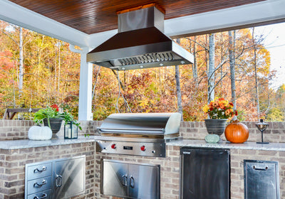 Customer kitchen with the Proline ProVI - Ducted Island Range Hood, Variable CFM | Stainless Steel, Outdoor Rated Finish Option