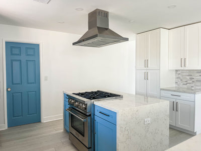 Customer kitchen with the Proline PLFI 520 - Ducted Island Range Hood, 600/1100 CFM | Stainless Steel Finish