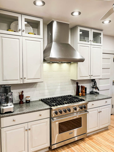 Customer kitchen with the Proline PLJW 109 WC - Ducted Wall-Mounted Range Hood, 1200 CFM | Stainless Steel Finish, Outdoor Rated