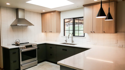 Customer kitchen with the Proline PLJW 129 - Ducted Indoor/Outdoor Wall-Mounted Range Hood, 900/1200 CFM | Stainless Steel Finish