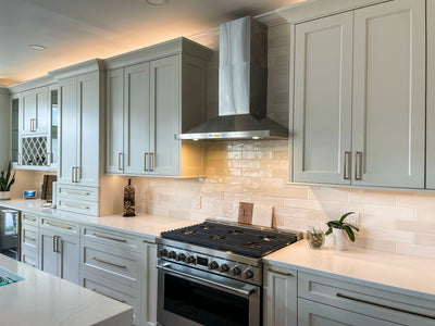 Customer kitchen with the Proline PLFW 520 - Wall-Mounted Range Hood, 600/1200 CFM | Convertible to Ductless, Stainless Steel, Matte Black Finish