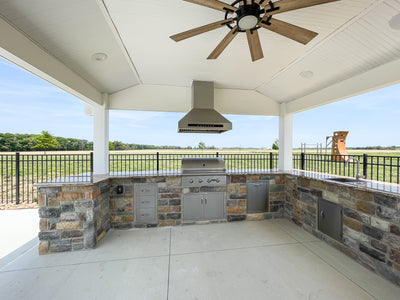 Customer kitchen with the Proline PLJI 102 - Island Range Hood, 1200 CFM | Stainless Steel, Outdoor Rated Finish Option