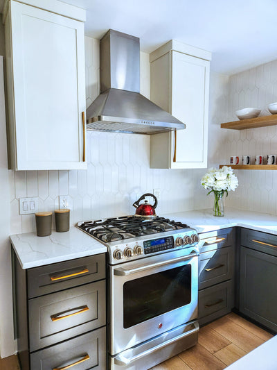 Customer kitchen with the Proline PLJW 129 - Ducted Indoor/Outdoor Wall-Mounted Range Hood, 900/1200 CFM | Stainless Steel Finish