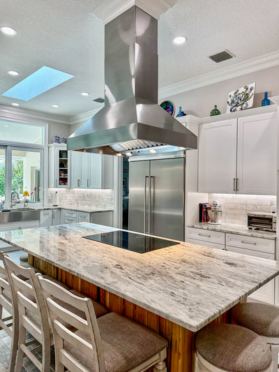Customer kitchen with the Proline ProVI - Ducted Island Range Hood, Variable CFM | Stainless Steel, Outdoor Rated Finish Option