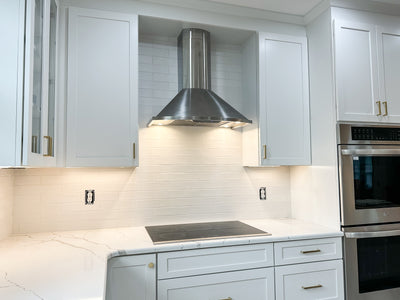 Customer kitchen with the Proline Vector - Ducted Wall-Mounted Range Hood, 600 CFM | Stainless Steel Finish