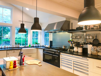 Customer kitchen with the Proline PLJW 109 - Wall-Mounted Range Hood, 1000/2000 CFM | Convertible to Ductless, Stainless Steel Finish, Outdoor Rated
