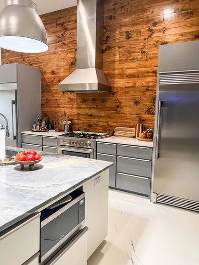 Customer kitchen with the Wall Mounted Range Hood, Ducted, Variable CFM, Stainless Steel Finish, Outdoor Rated Finish option | Proline ProVWC