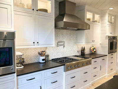 Customer kitchen with the Wall Mounted Range Hood, Ducted, Variable CFM, Stainless Steel Finish, Outdoor Rated Finish option | Proline ProVWC