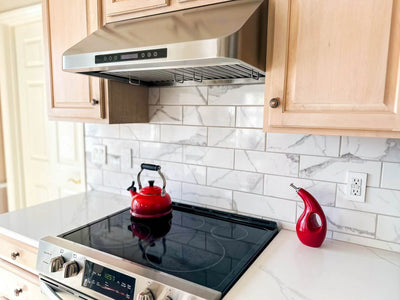 Customer kitchen with the Proline PLJW 113 - Under Cabinet Vent Hood, 900 CFM | Convertible to Ductless, Stainless Steel with Modern Control Panel