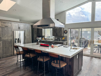 Customer kitchen with the Proline PLJI 102 - Island Range Hood, 1200 CFM | Stainless Steel, Outdoor Rated Finish Option