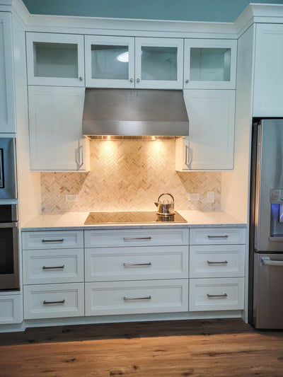 Customer kitchen with the Under-Cabinet Range Hood, Convertible to Ductless, Stainless Steel Finish, Outdoor Rated | Proline PLJW 105