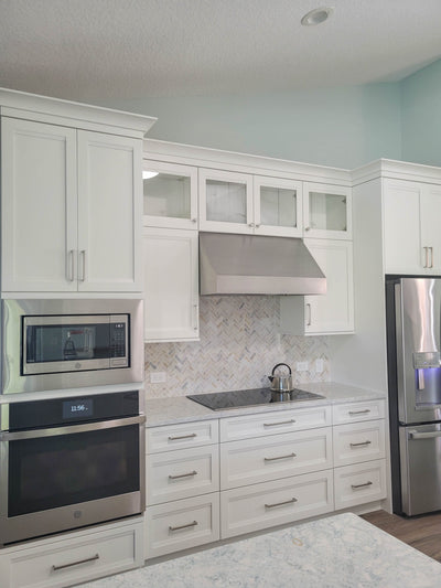 Customer kitchen with the Under-Cabinet Range Hood, Convertible to Ductless, Stainless Steel Finish, Outdoor Rated | Proline PLJW 105