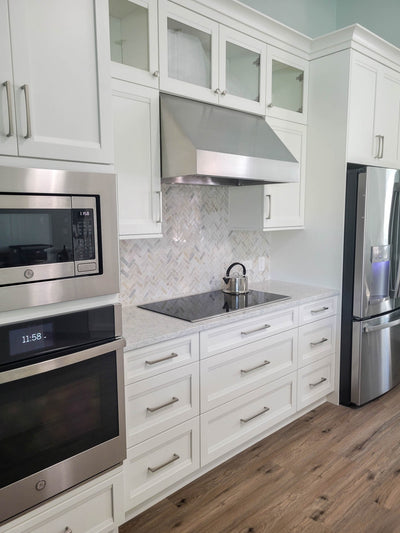 Customer kitchen with the Under-Cabinet Range Hood, Convertible to Ductless, Stainless Steel Finish, Outdoor Rated | Proline PLJW 105