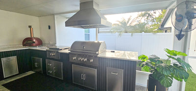Customer kitchen with the Proline PLGI 104 304 SS - Ducted Island Range Hood, 1200 CFM | Weather Resistant 304 Stainless Steel