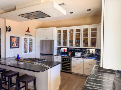Customer kitchen with the Proline PLFI - 42-Inch Ceiling Flush Mount Range Hood, 1200 CFM | Stainless Steel Finish