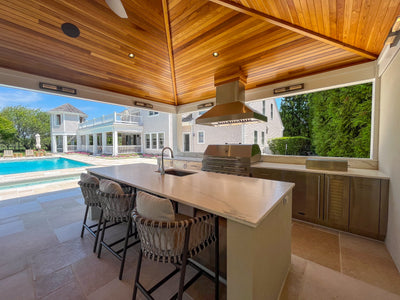 Customer kitchen with the Proline ProVI - Ducted Island Range Hood, Variable CFM | Stainless Steel, Outdoor Rated Finish Option