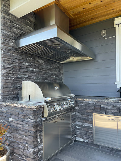 Customer kitchen with the Wall Mounted Range hood, Ducted, 2000 CFM, Thick 304 Stainless Steel | PLGW WC BBQ Pro