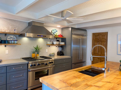 Customer kitchen with the Proline PLJW 130 - Ducted Wall-Mounted Range Hood, 900/1200 CFM | Stainless Steel Finish
