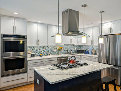 Customer kitchen with the Proline PLFI 544 - Ducted Island Range Hood, 600 CFM | Stainless Steel Finish