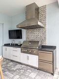 PLGW WC BBQ Ultra range hood from ProlineRangeHoods.com above an outdoor grill and cabinets.