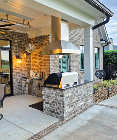 Customer kitchen with the Proline PLGI 104 304 SS - Ducted Island Range Hood, 1200 CFM | Weather Resistant 304 Stainless Steel