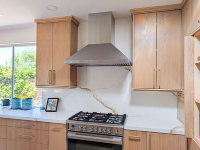 Customer kitchen with the Proline PLGW 129 SC - Ducted Wall-Mounted Range Hood, 900/1200 CFM | Stainless Steel Finish