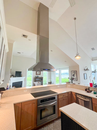 Customer kitchen with the Proline ProSI Ducted Island Range Hood, 900/1800 CFM | 430/304 Stainless Steel Finish