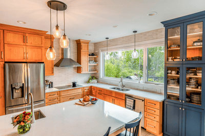 Customer kitchen with the Proline PLJW 129 - Ducted Indoor/Outdoor Wall-Mounted Range Hood, 900/1200 CFM | Stainless Steel Finish