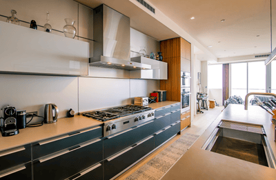Customer kitchen with the Proline PLFW 750 - Ducted Wall-Mounted Range Hood, 900/1100 CFM | Stainless Steel Finish