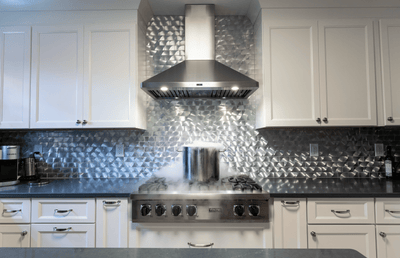Customer kitchen with the Proline PLFW 129 J - Wall-Mounted Vent Hood, 900 CFM | Stainless Steel