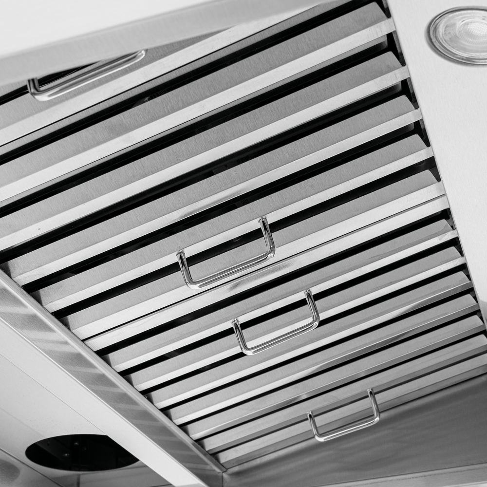 Close-up of Proline PLJW 102 range hood in stainless steel, 1000 CFM, ductless option. ProlineRangeHoods.com.