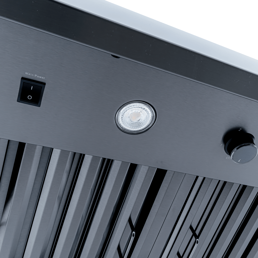 Close-up of Proline PLJW 104 wall-mounted hood (1200 CFM, stainless steel) at ProlineRangeHoods.com, with controls and filters.