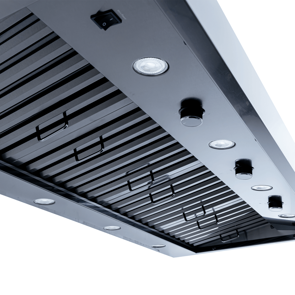 Close-up of Proline PLJW 104 range hood with dual 1200 CFM blowers, LED lights, and steel finish. ProlineRangeHoods.com.