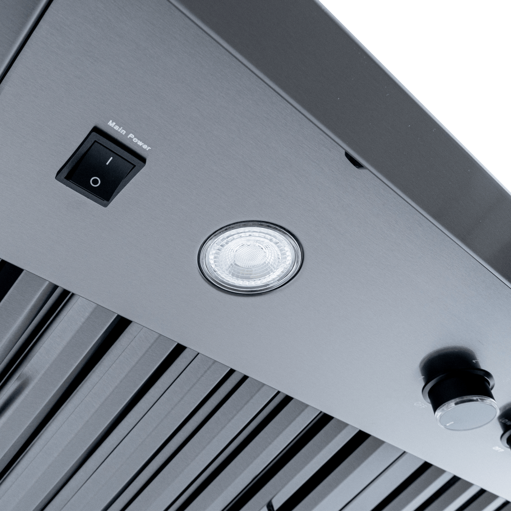 Close-up of Proline PLJW 104 wall-mounted range hood, stainless steel, dual blower, filters. ProlineRangeHoods.com.