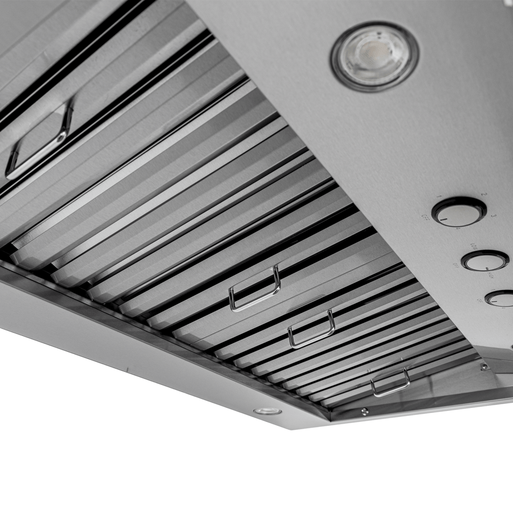 Close-up of Proline PLJW 104 wall-mounted range hood, stainless steel finish, dual 1200 CFM blowers, at ProlineRangeHoods.com.