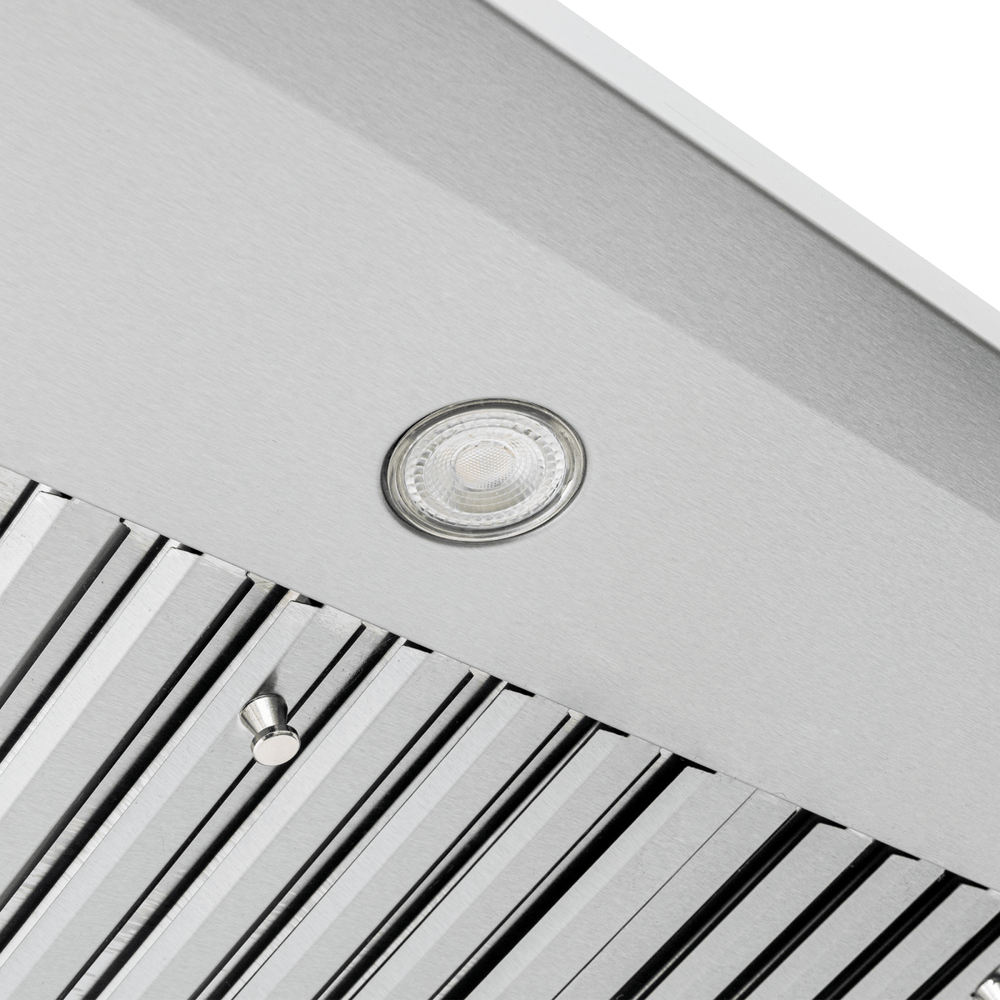 Close-up of Proline PLJW 117 range hood by Proline Range Hoods, 900 CFM, baffle filters, light; ProlineRangeHoods.com.
