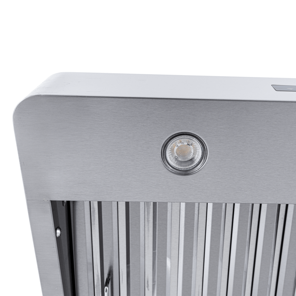 Close-up of Proline PLJW 130 stainless range hood with light and vent slats, 900/1200 CFM. ProlineRangeHoods.com.