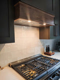 Modern kitchen design showcasing a Proline UMOD INS - Custom Insert Range Hood